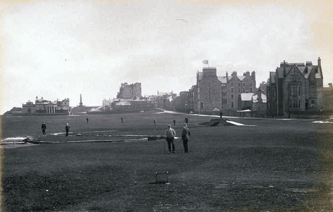 Historic photograph of golfers and the Old Course at St Andrews in 1891