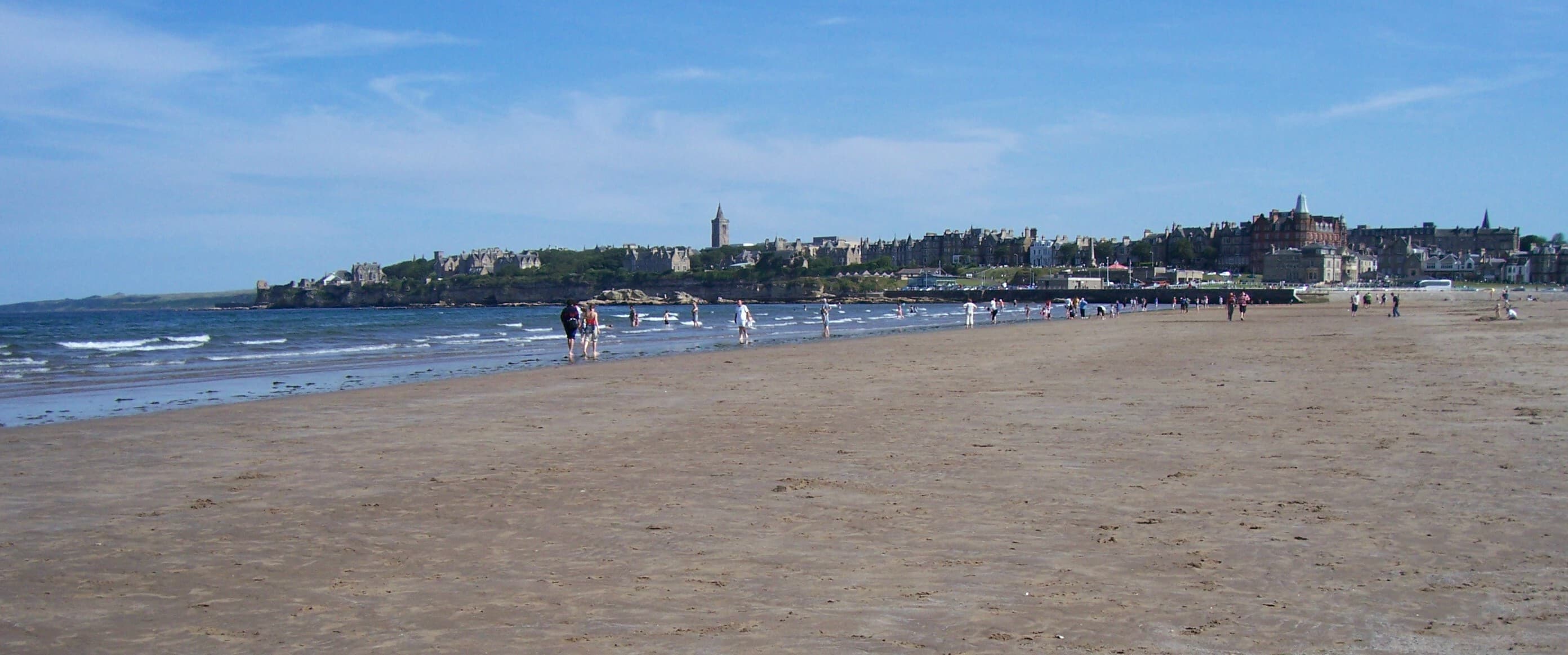 St Andrews seen across the broad beach and shoreline of West Sands